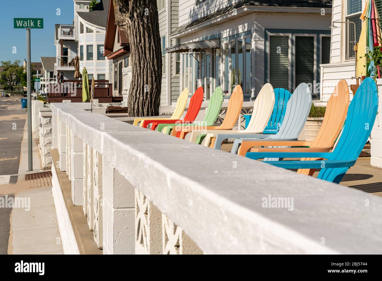 Row of colorful patio chairs in South Haven, Michigan Stock Photo