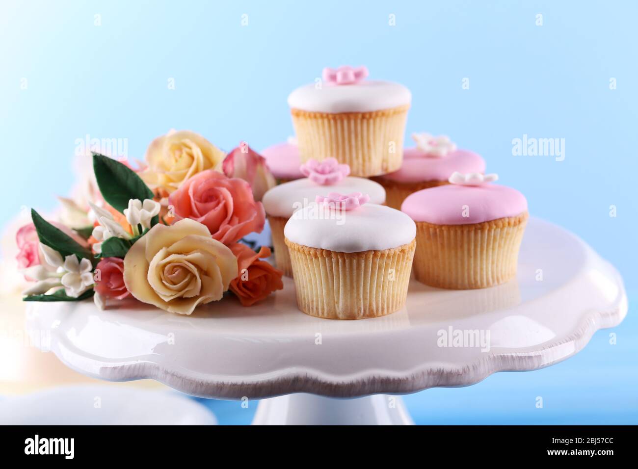 Tasty cupcake on stand, close-up Stock Photo