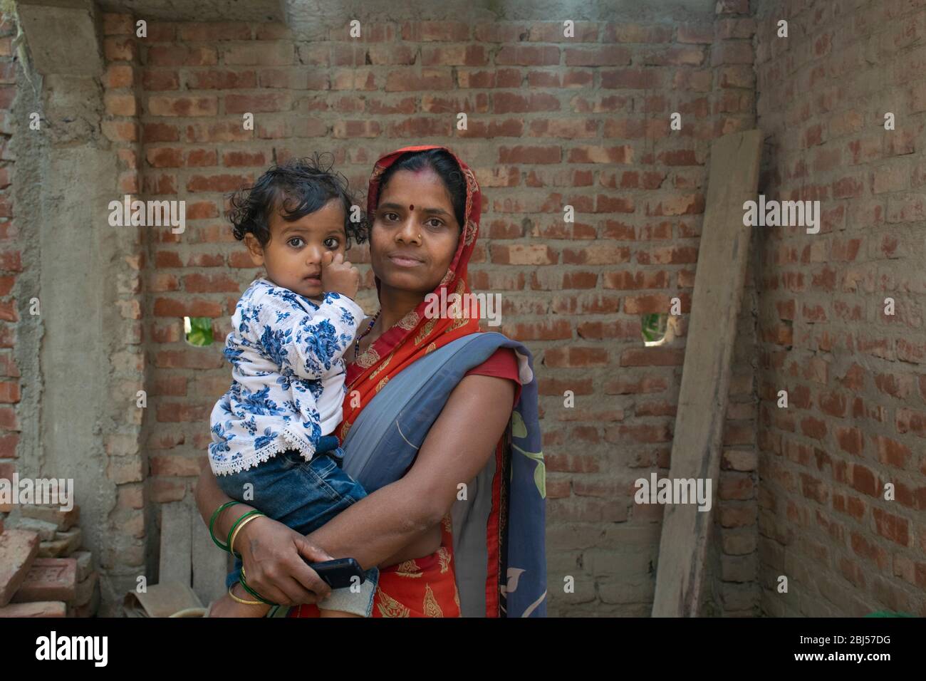 mother and daughter in rural village Stock Photo