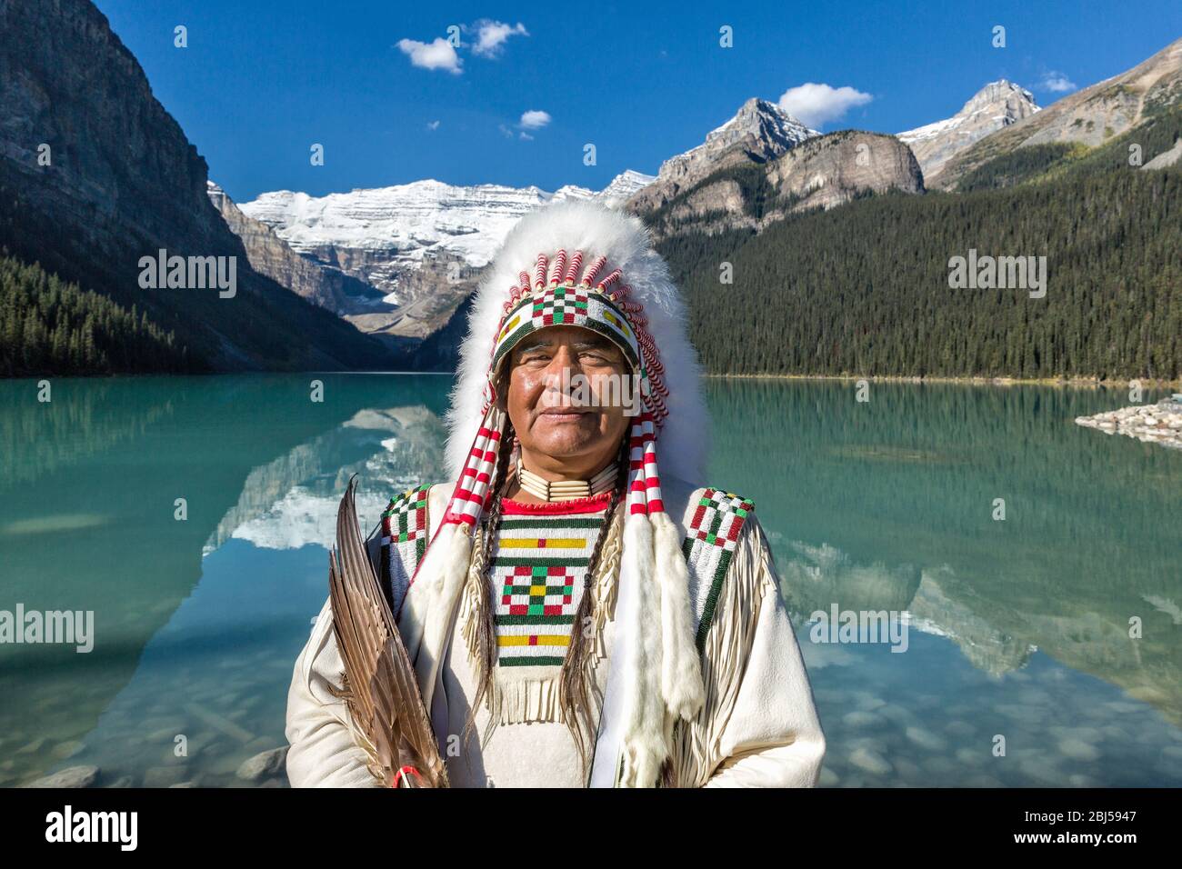 Cree Chief (model released) at Lake Louise, Banff National Park, Canadian Rockies. Stock Photo