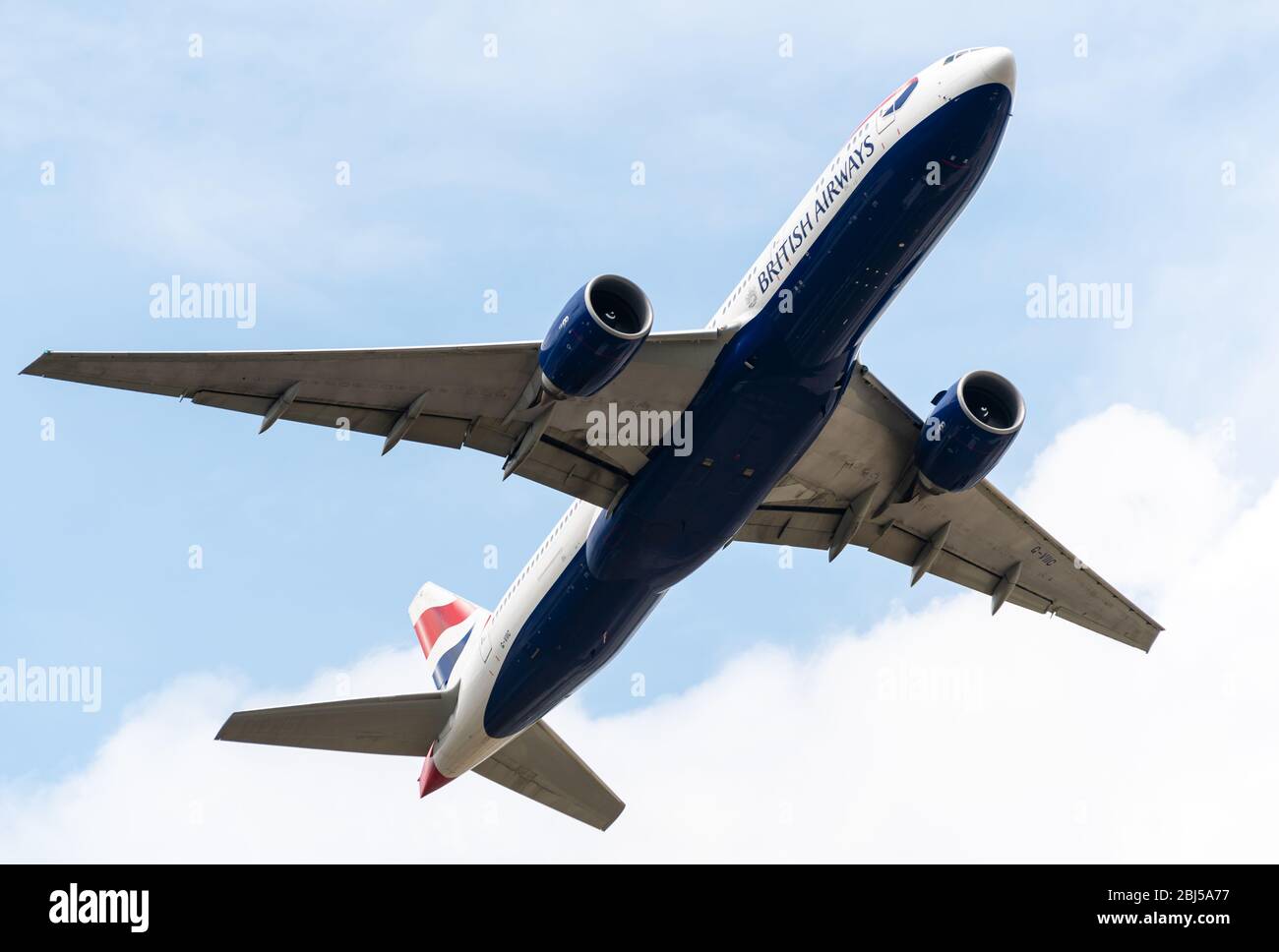 Heathrow, United Kingdom - August 03 2019:  British Airways Boeing 777-236 registration G-VIIC,  flight number BA125 departs Heathrow airport en route Stock Photo