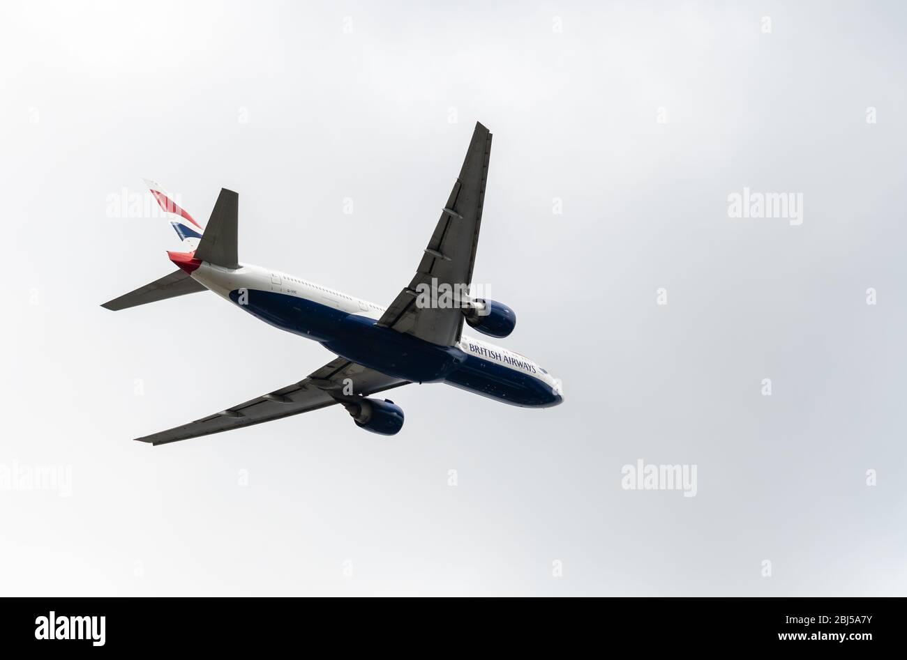 Heathrow, United Kingdom - August 03 2019:  British Airways Boeing 777-236 registration G-VIIC,  flight number BA125 departs Heathrow airport en route Stock Photo