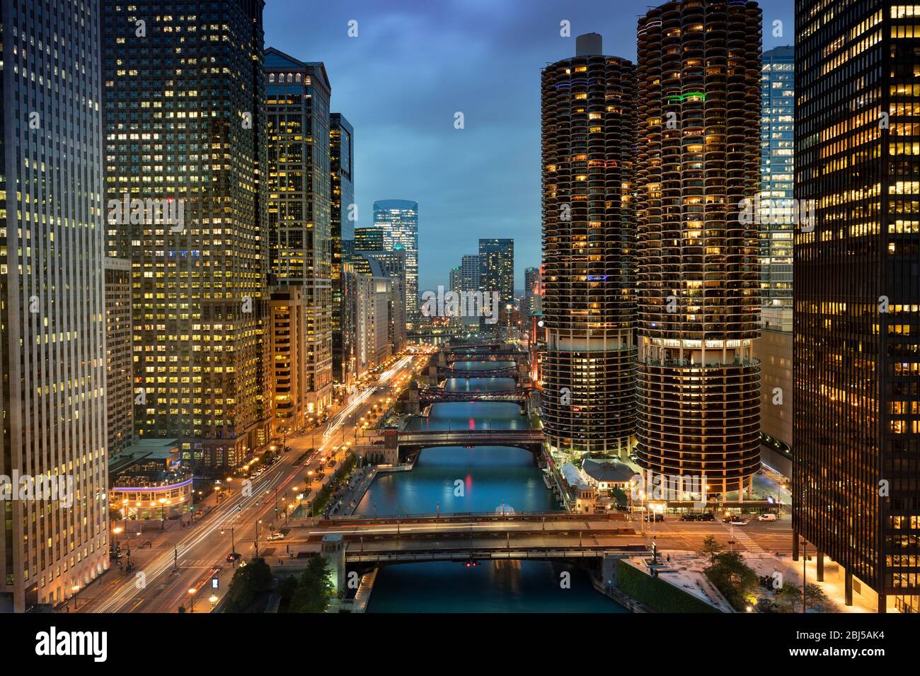 Downtown city buildings and skyline over the Chicago River Illinois USA ...