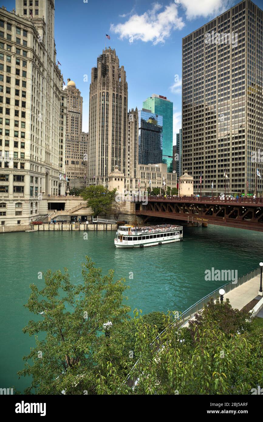 Ferry boat passes under the DuSable Bridge over the Chicago River in ...