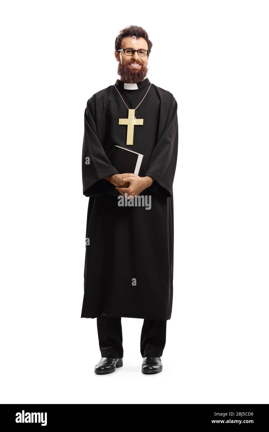 Full length portrait of a priest standing and holding the Bible