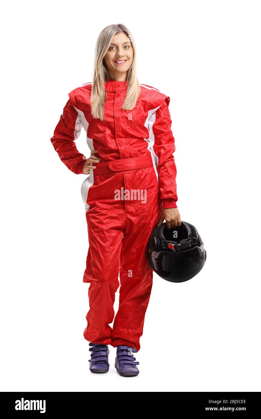Full length portrait of a young woman in a racing suit holding a helmet isolated on white background Stock Photo