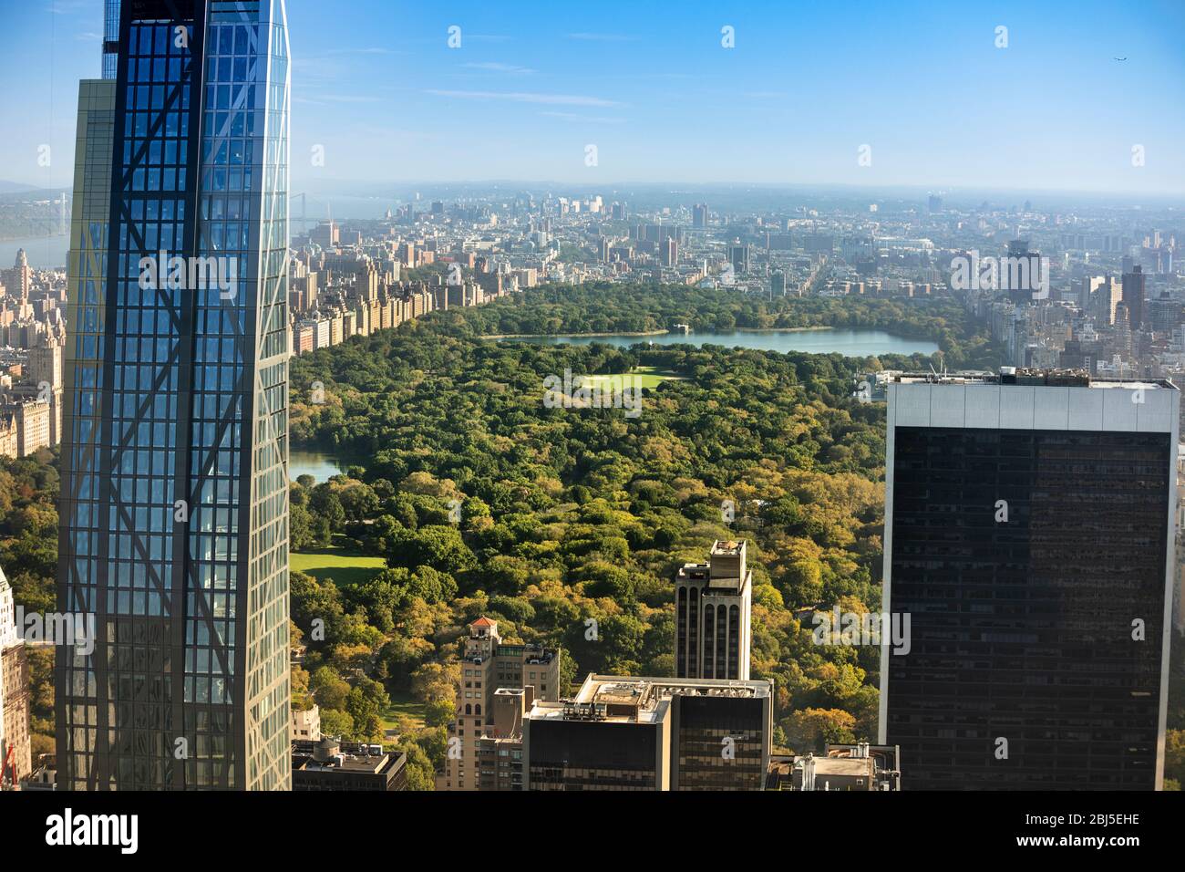 Aerial view of the buildings and skyscrapers over Central Park and the Manhattan skyline in New York City USA Stock Photo