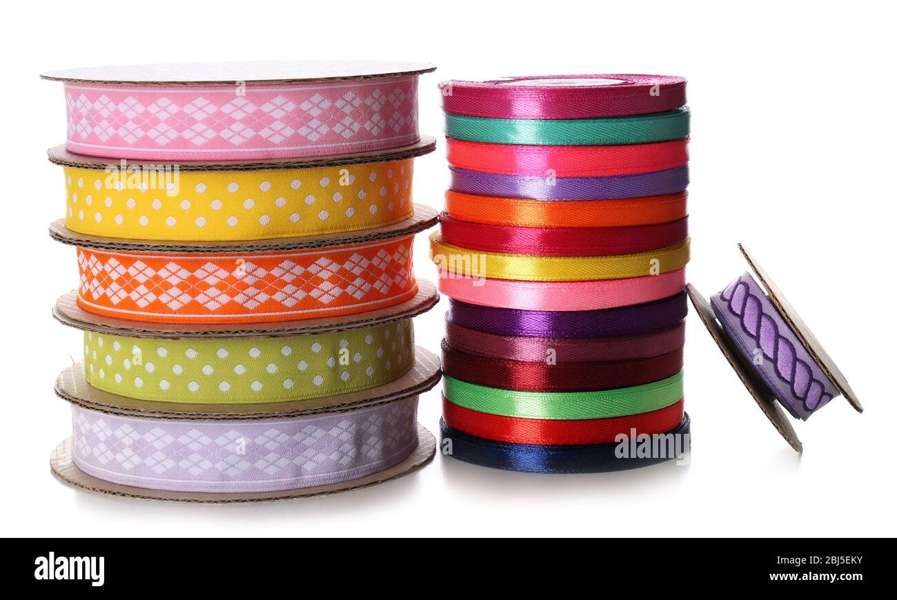 Spools of color ribbon, isolated on white Stock Photo - Alamy