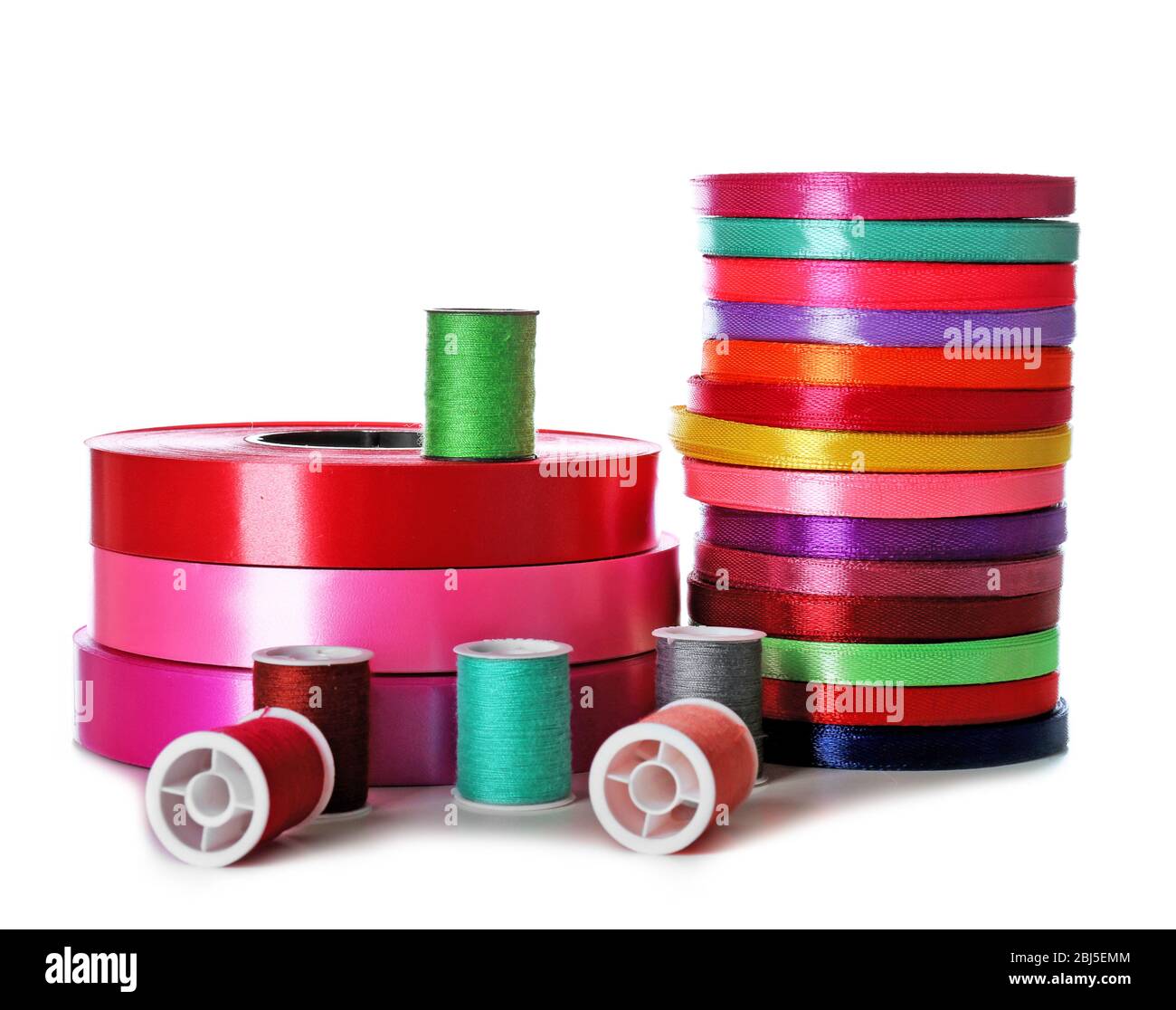 Spools of color ribbon and thread, isolated on white Stock Photo - Alamy