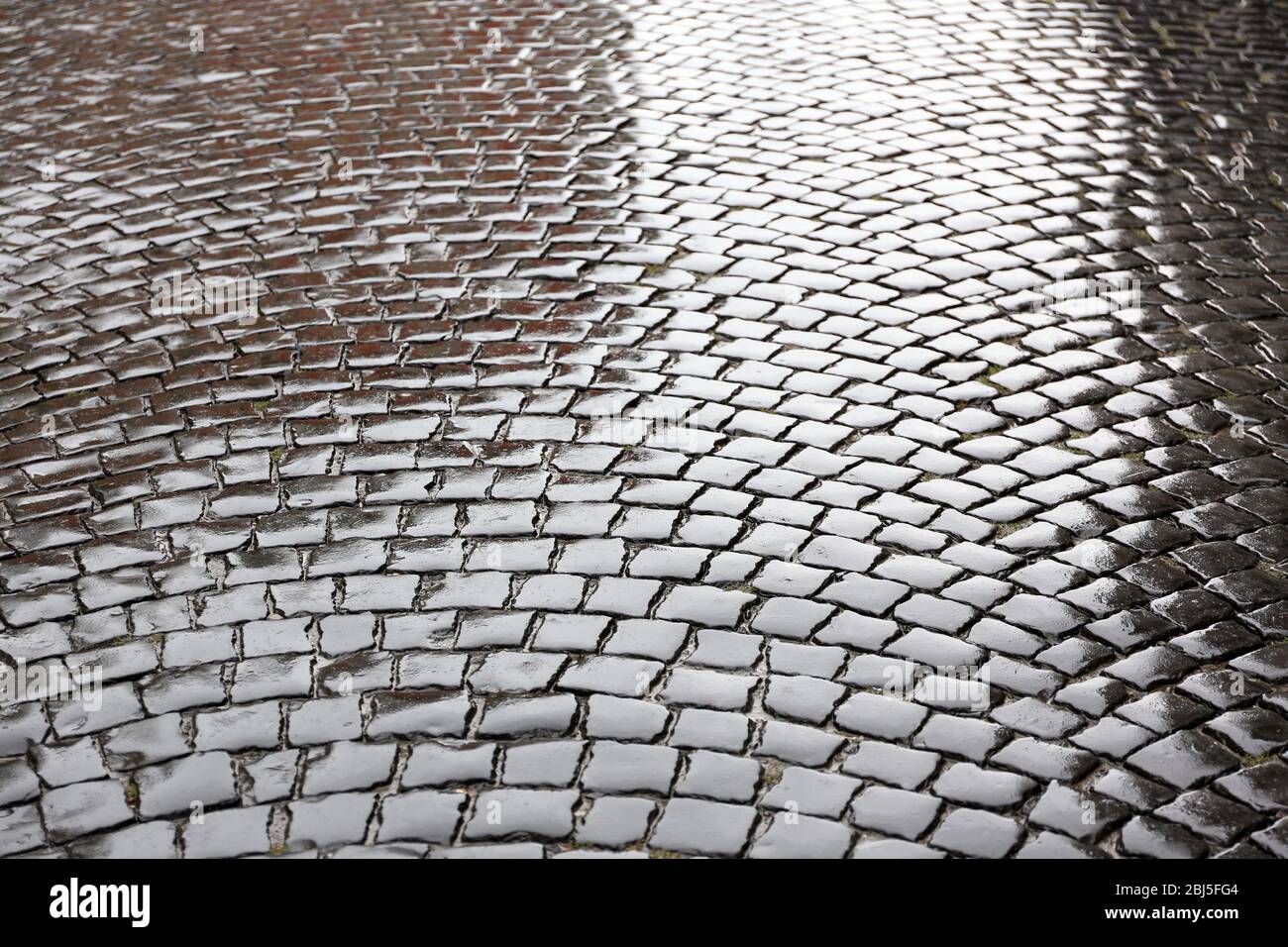 Wet stone pavement Stock Photo - Alamy