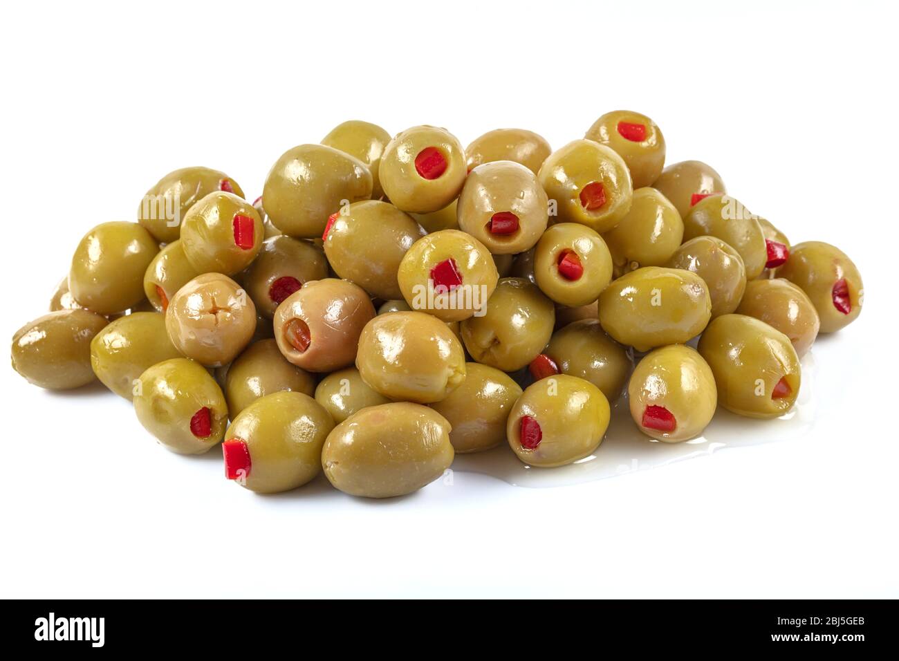 Green olives filled with red pepper. Green olives stuffed with red