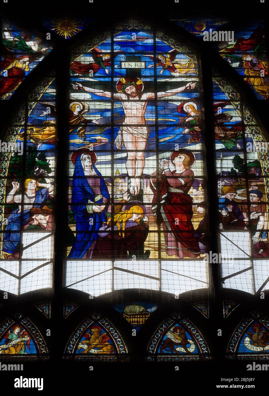 PARIS - SEPT 16, 2014: The Art Nouveau stained glass was executed by Jac Galland according to the design of Pascal Blanchard. The Church of Saint-Jean Stock Photo