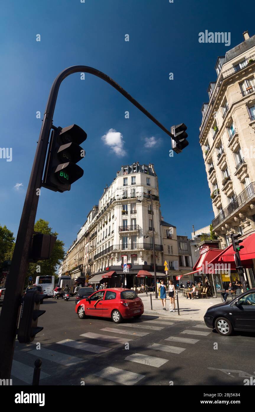 PARIS - SEPT 16, 2014: Traffic lights and pedestrian crossing the Boulevard de Rochechouart, Paris, France. Stock Photo