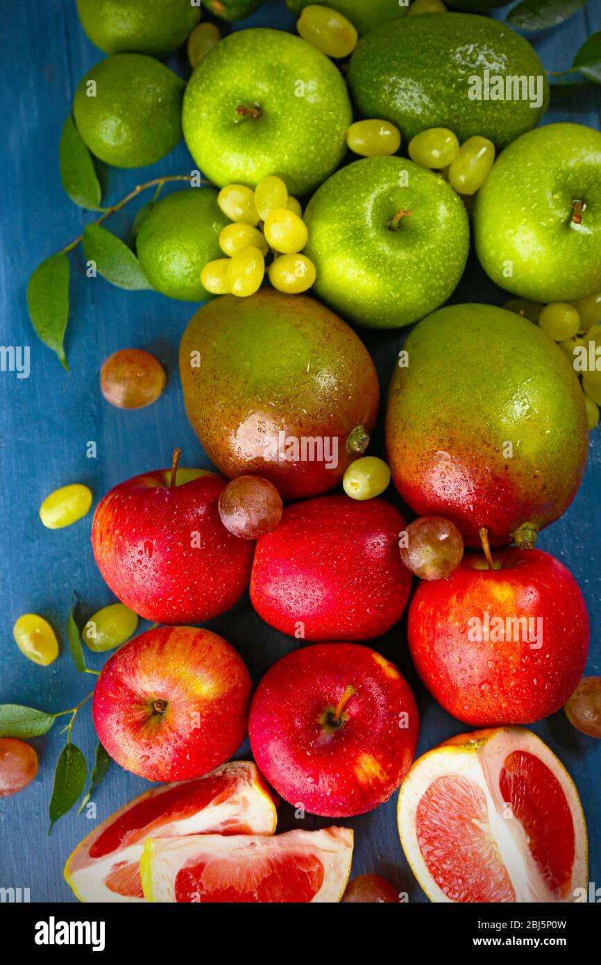 Fruits on dark blue wooden background Stock Photo