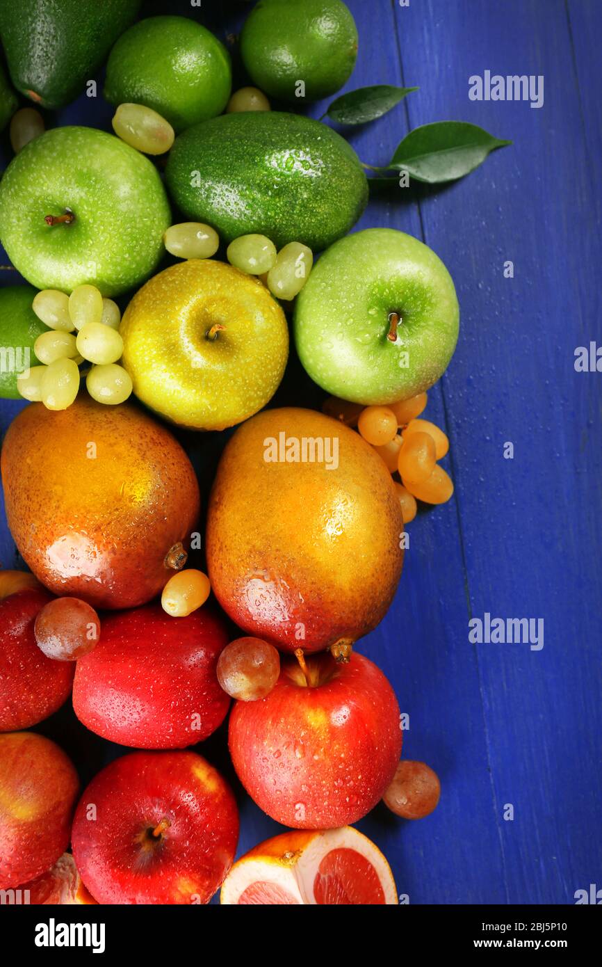 Fruits on dark blue wooden background Stock Photo