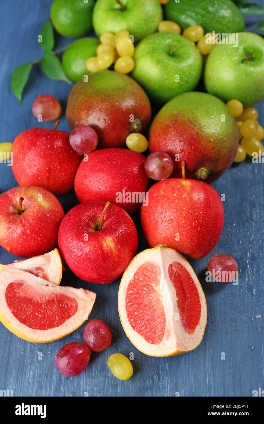 Fruits on dark blue wooden background Stock Photo