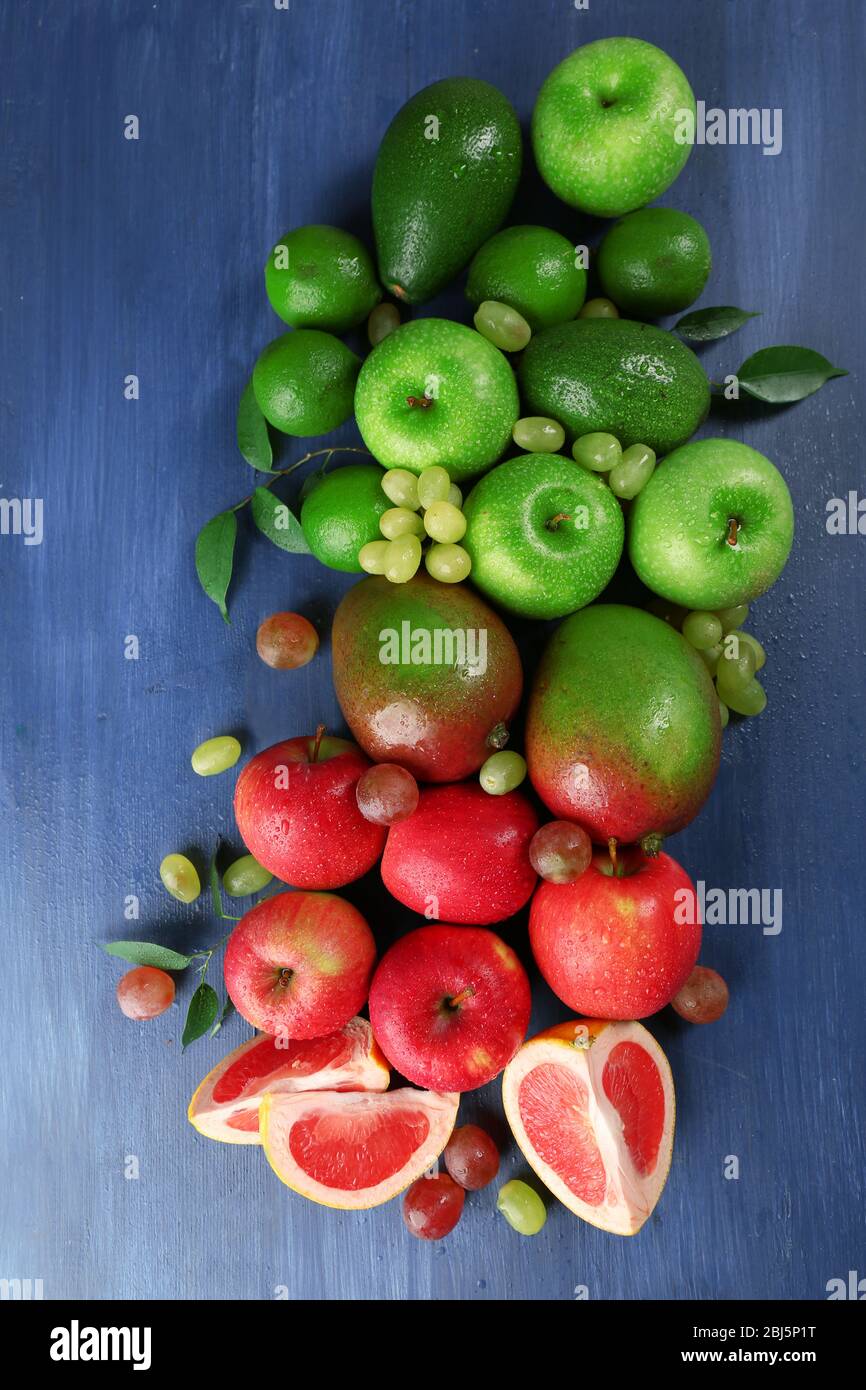 Fruits on dark blue wooden background Stock Photo