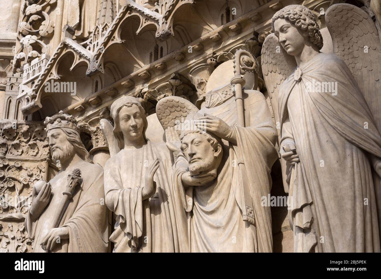 The four large statues represent an unidentified beheaded king and