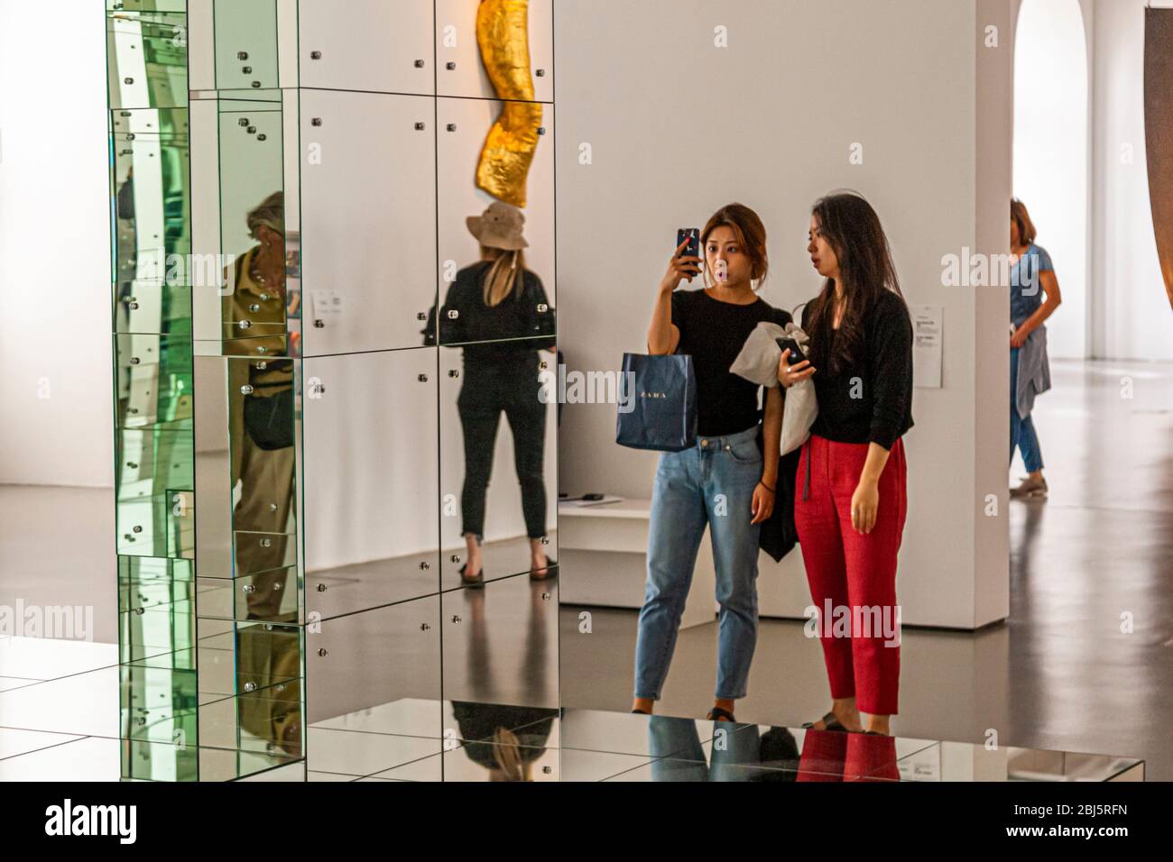 The mirror, the selfie and me! And the art? Some visitors only see their own self in the context of the exhibition. Exhibition documenta 14, Kassel, Germany Stock Photo