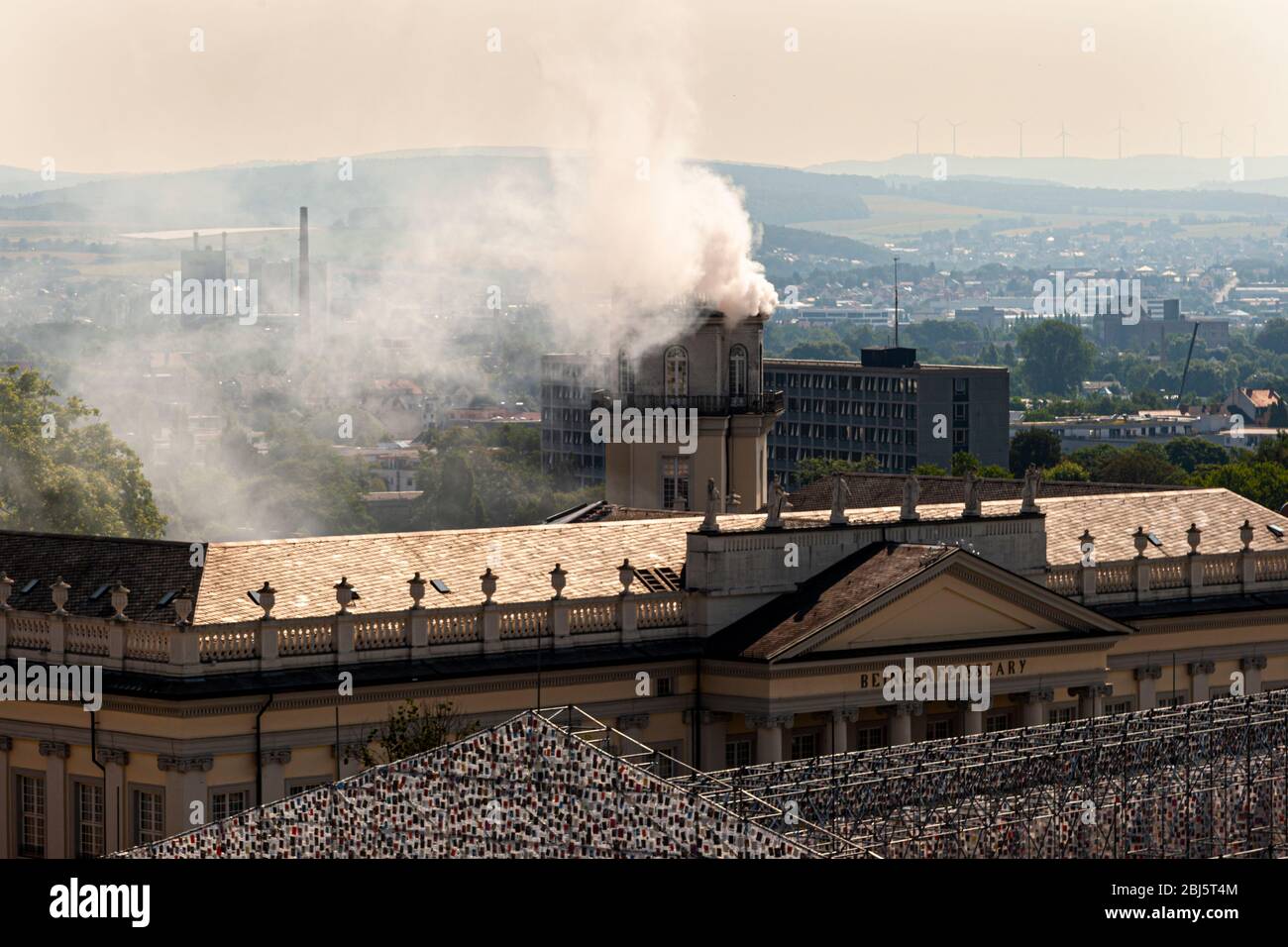 Parthenon of Books and Expiration Movement, Documenta 14 Installation in Zwehrenturm , Kassel, Germany. Kassel sends smoke signals from the Documenta from Zwehrenturm. Artist Daniel Knorr wants to use this smoke to send "warm signals" to Athens. Stock Photo