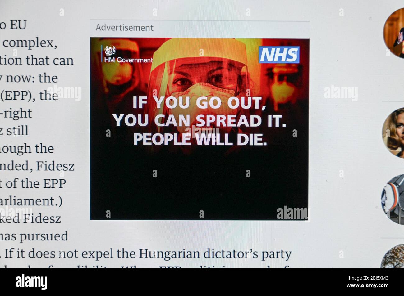 Covid/ Coronavirus. UK government public health advert 'If you go out you can spread it. People will die.', over a picture of a health worker. Stock Photo