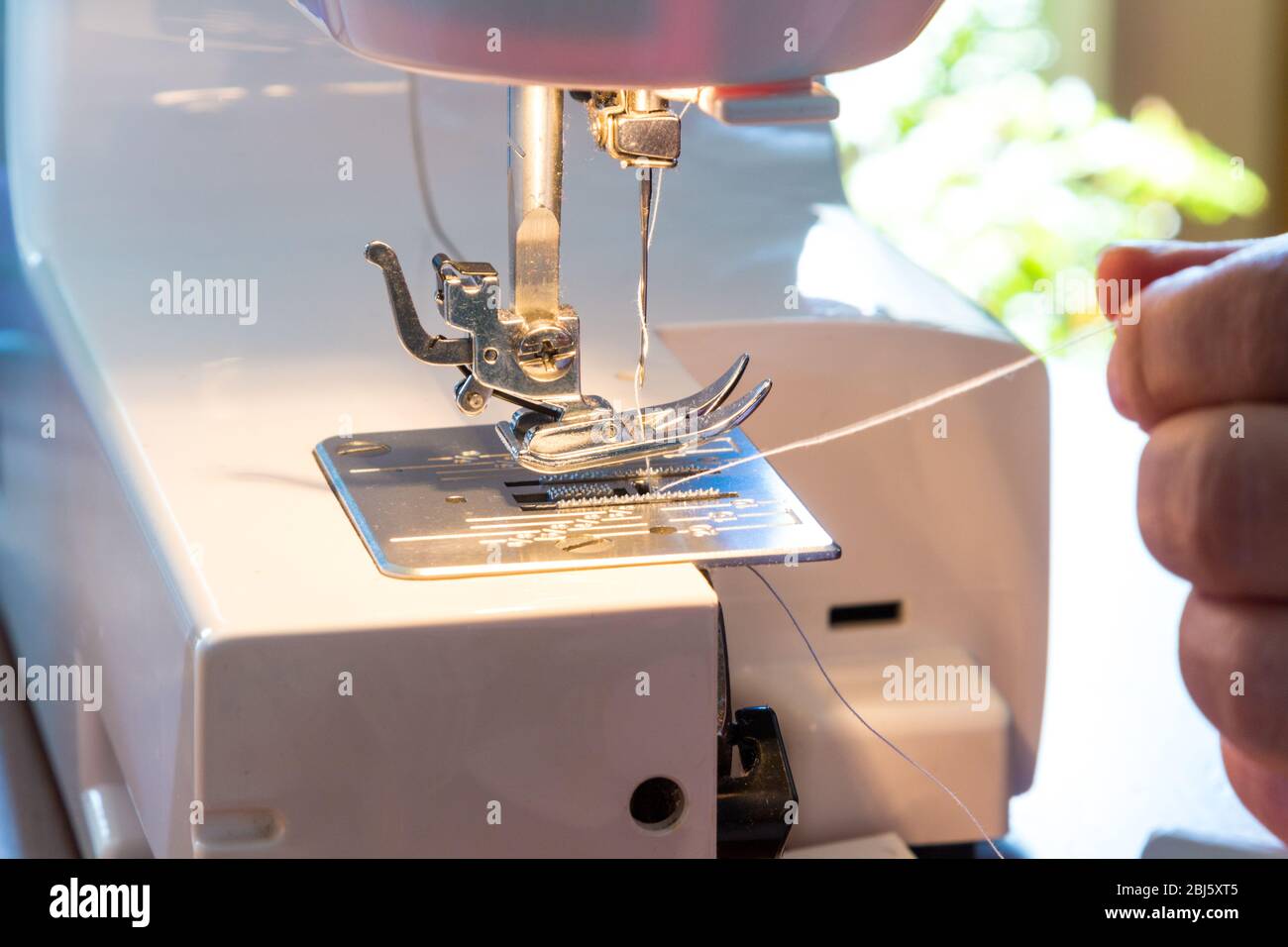 Threading needle hires stock photography and images Alamy