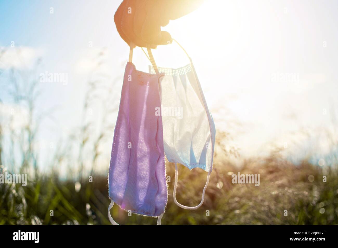 Holding mask hires stock photography and images Alamy