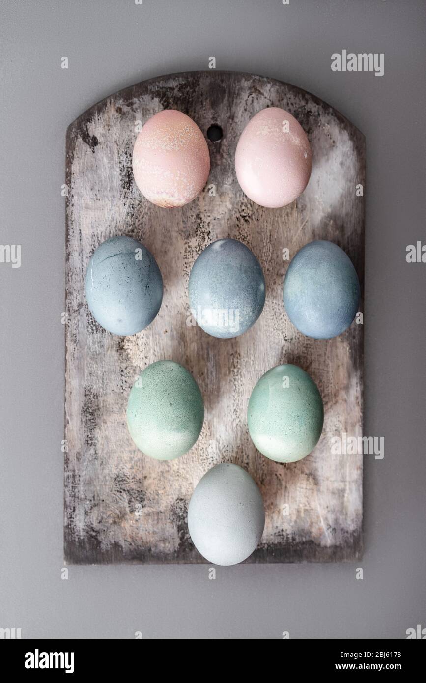 Setting easter table with colored eggs Stock Photo