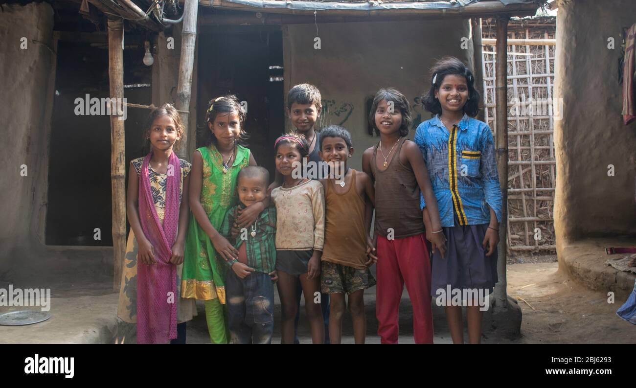 Happy young poor Indian children smiling, Bihar, India Stock Photo
