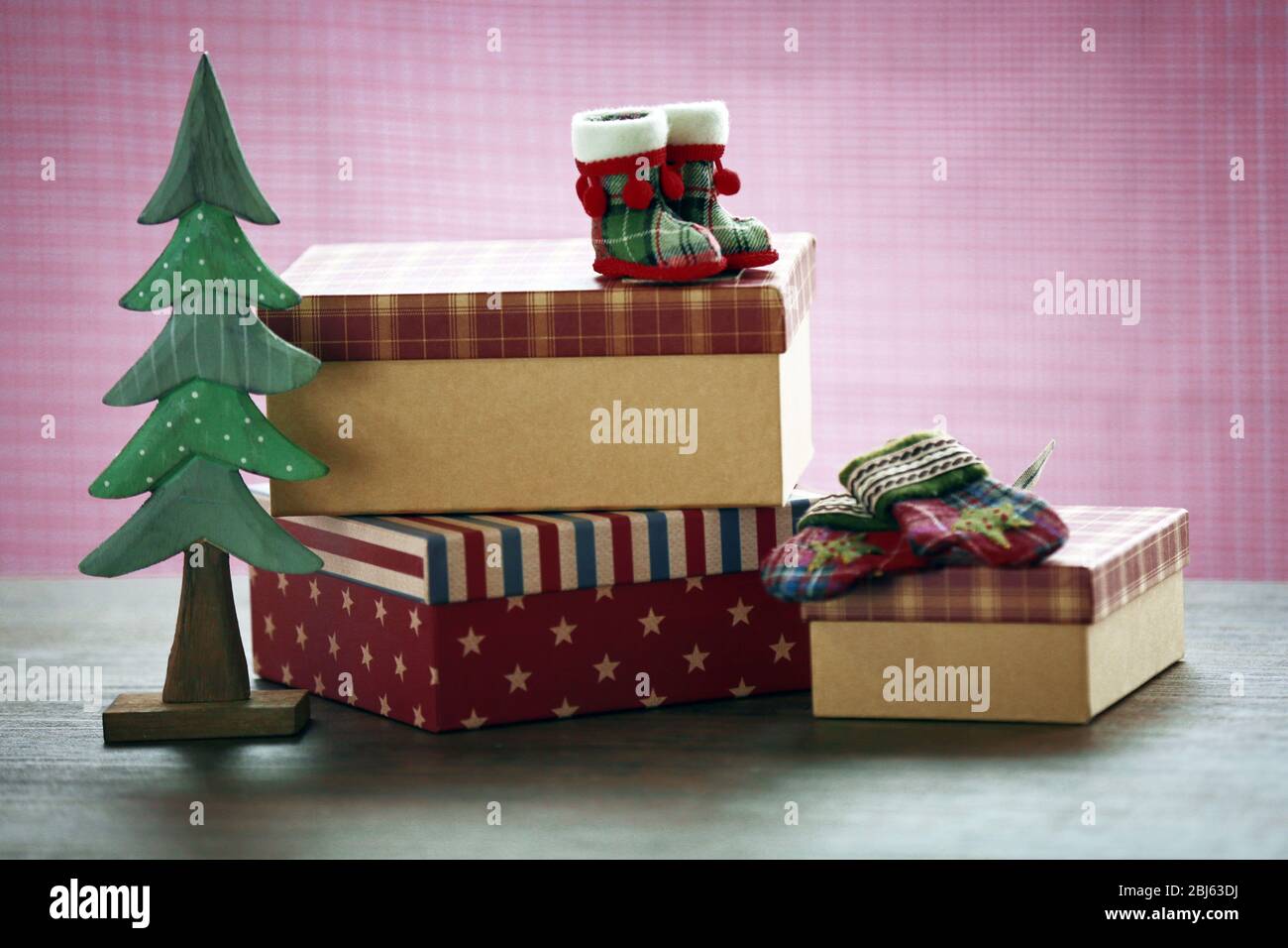 Christmas gifts on a table Stock Photo - Alamy