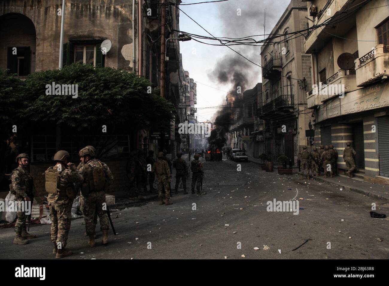 Tripoli, Lebanon, 28 April 2020. Lebanese army soldiers in the streets during riots that broke out following the death of a protestor shot by the army during protests triggered by economic collapse the previous night. Elizabeth Fitt Credit: Elizabeth Fitt/Alamy Live News Stock Photo