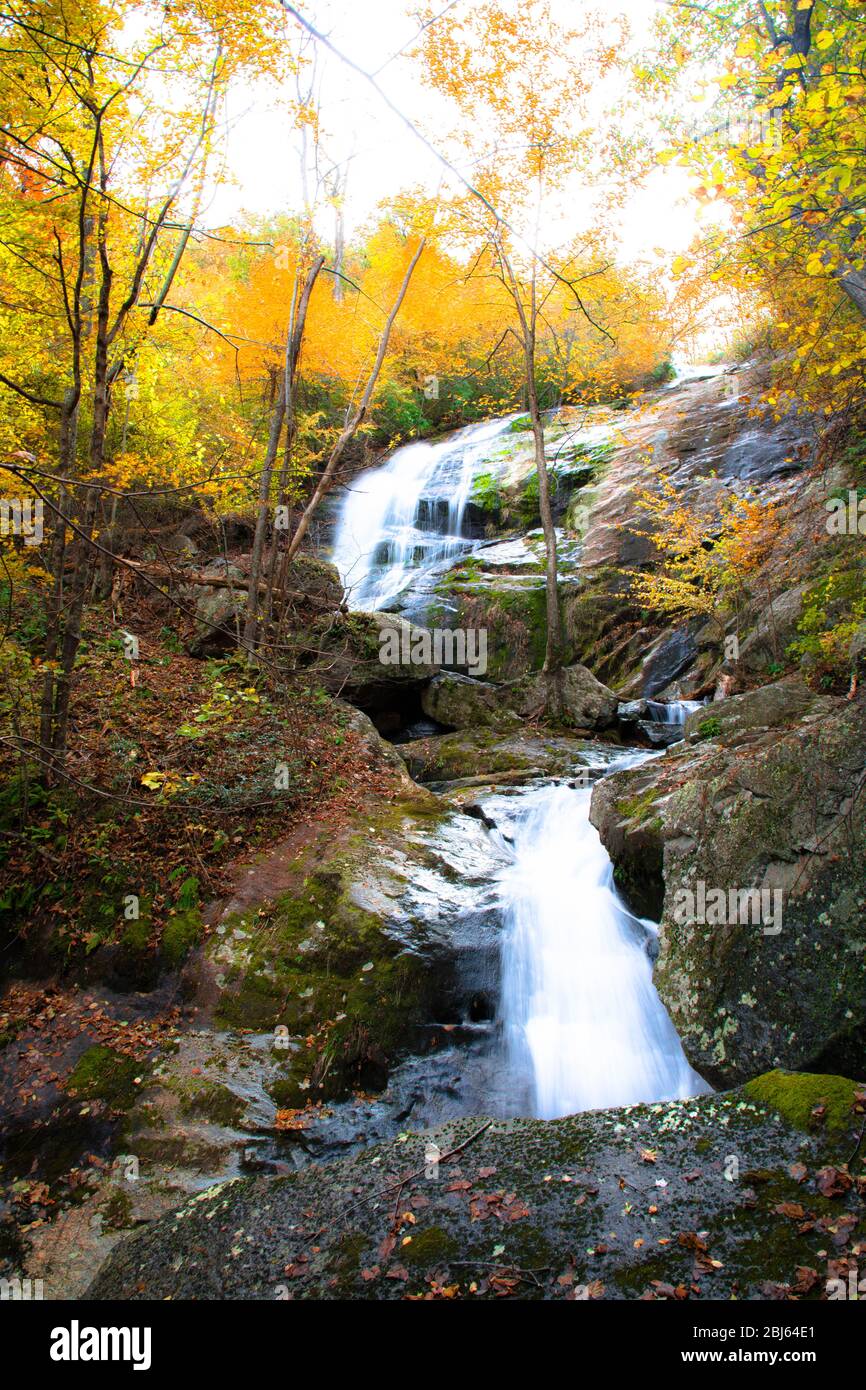 Waterfalls During Fall Beautiful cascading waterfalls in the mountains during autumn Stock ...