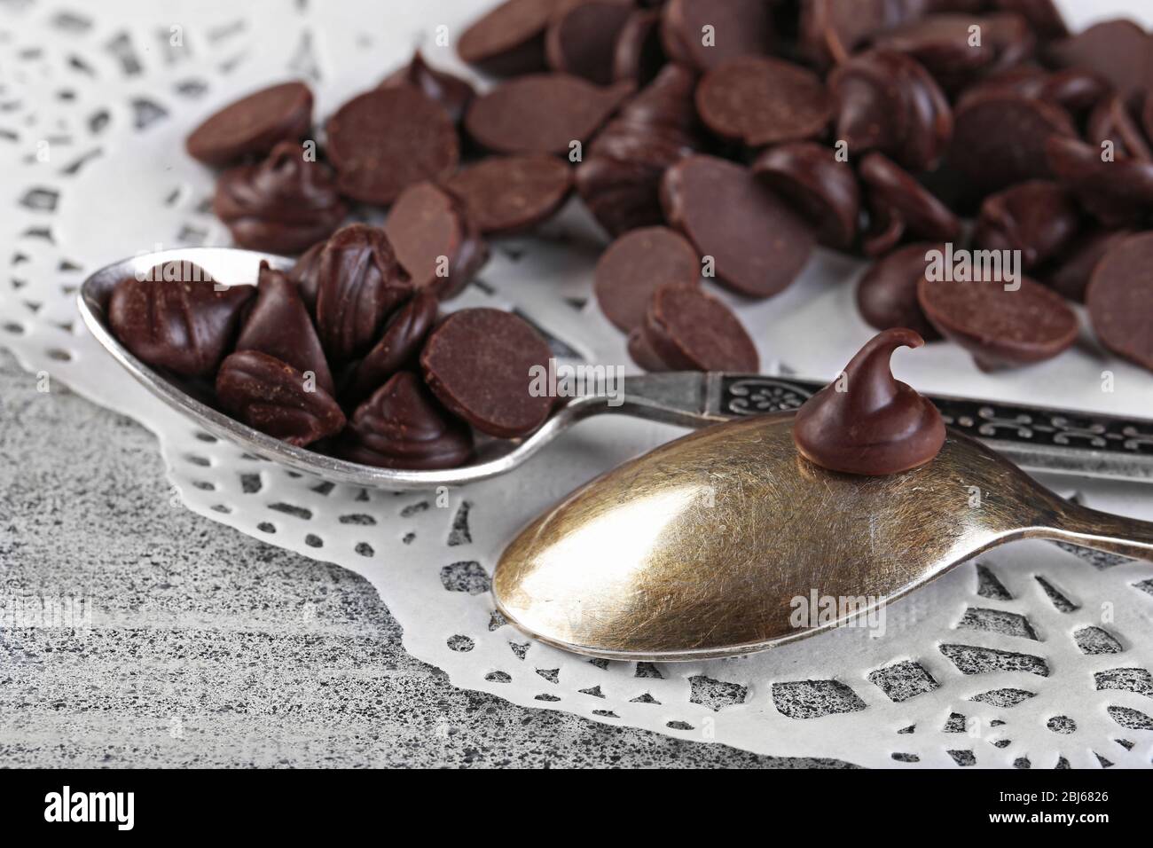 Choco Morrel Chocolate morsels on gray background Stock Photo - Alamy