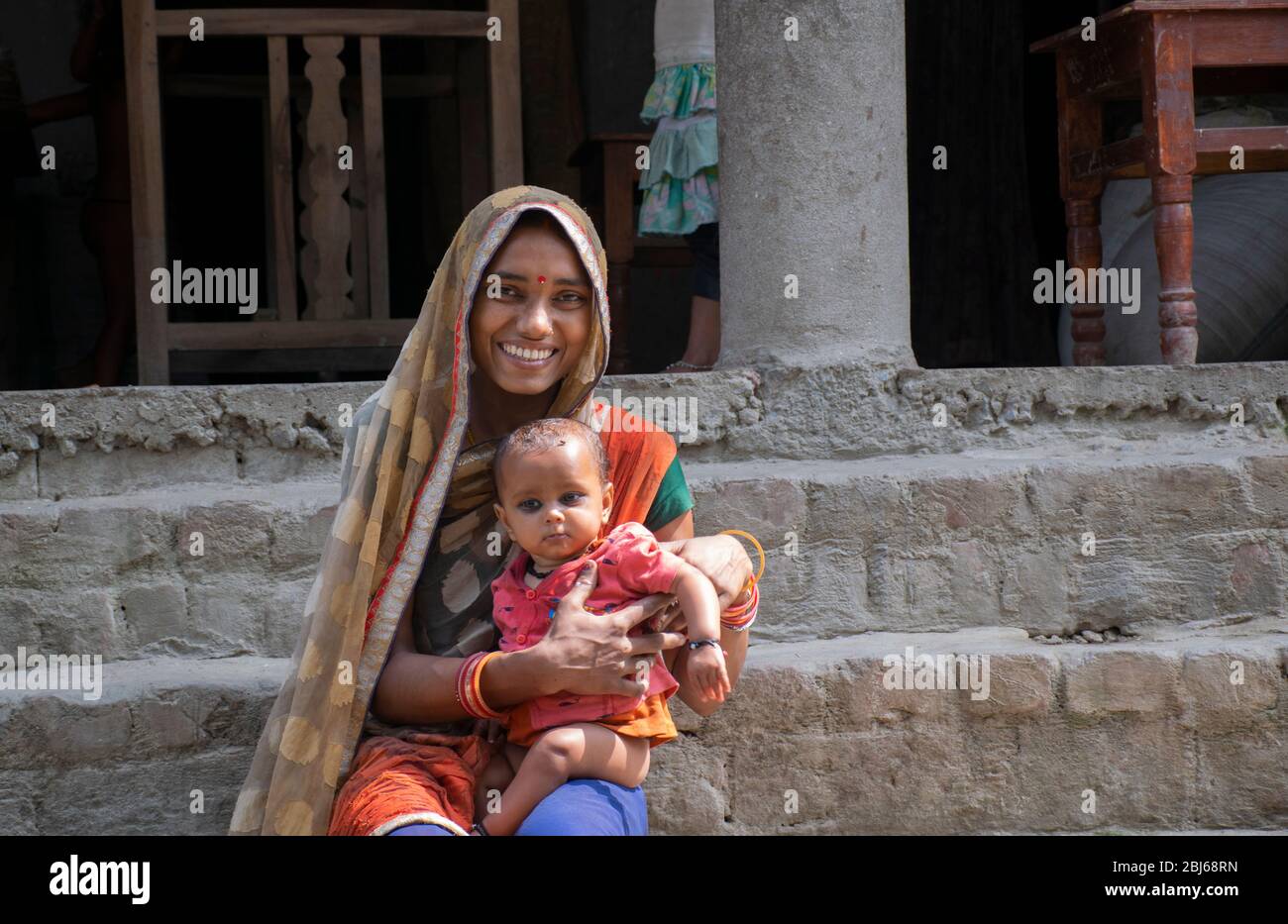 happy mother and her child in rural village, India Stock Photo - Alamy