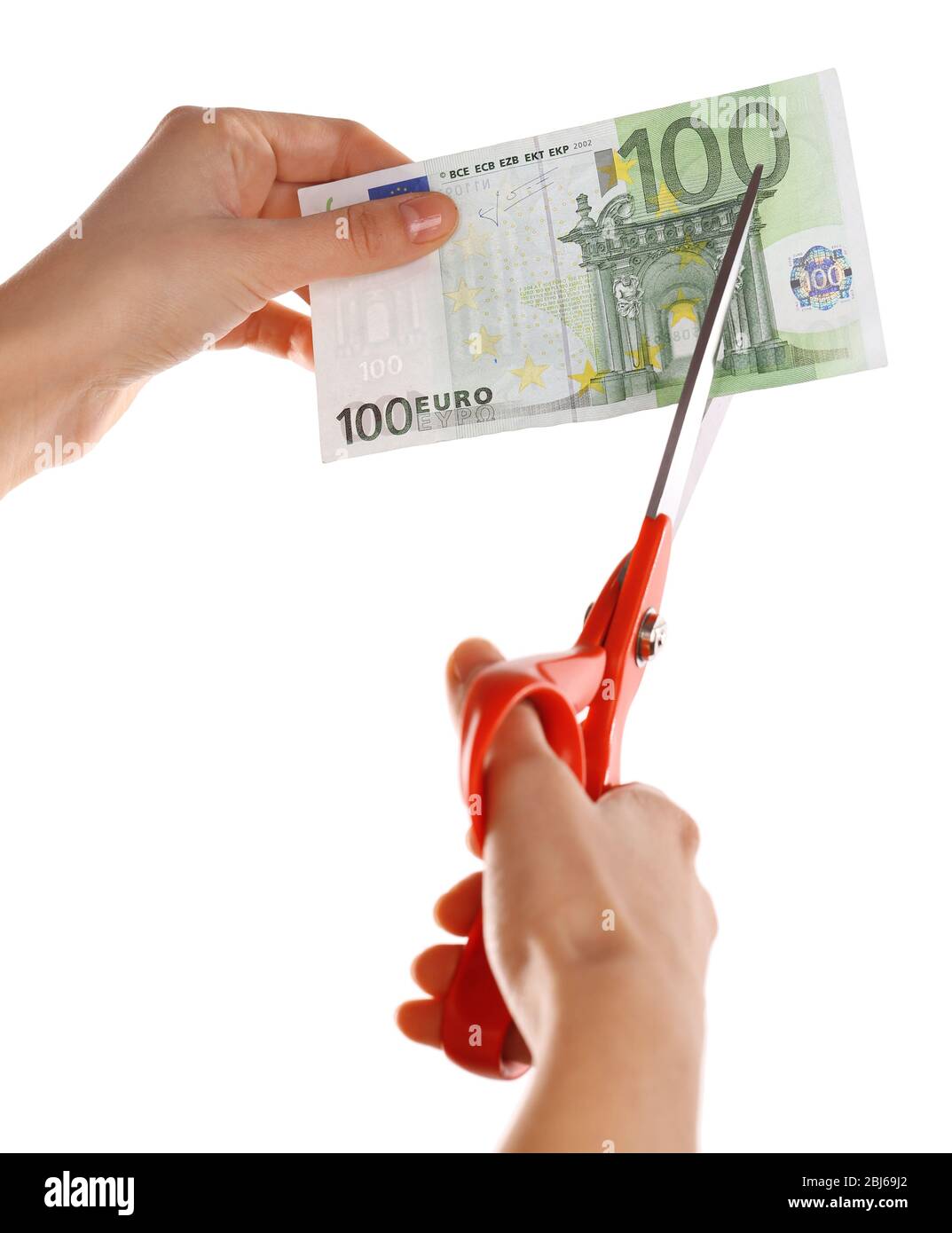 Hands with scissors cutting Euro banknote, isolated on white Stock ...