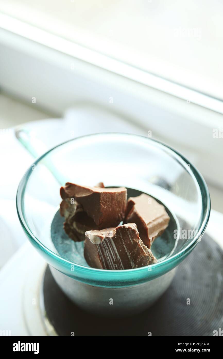 Melting chocolate on stove Stock Photo Alamy