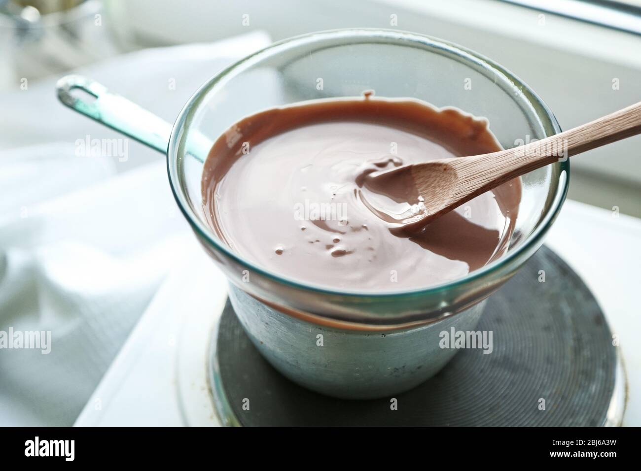 Melting chocolate stove hires stock photography and images Alamy