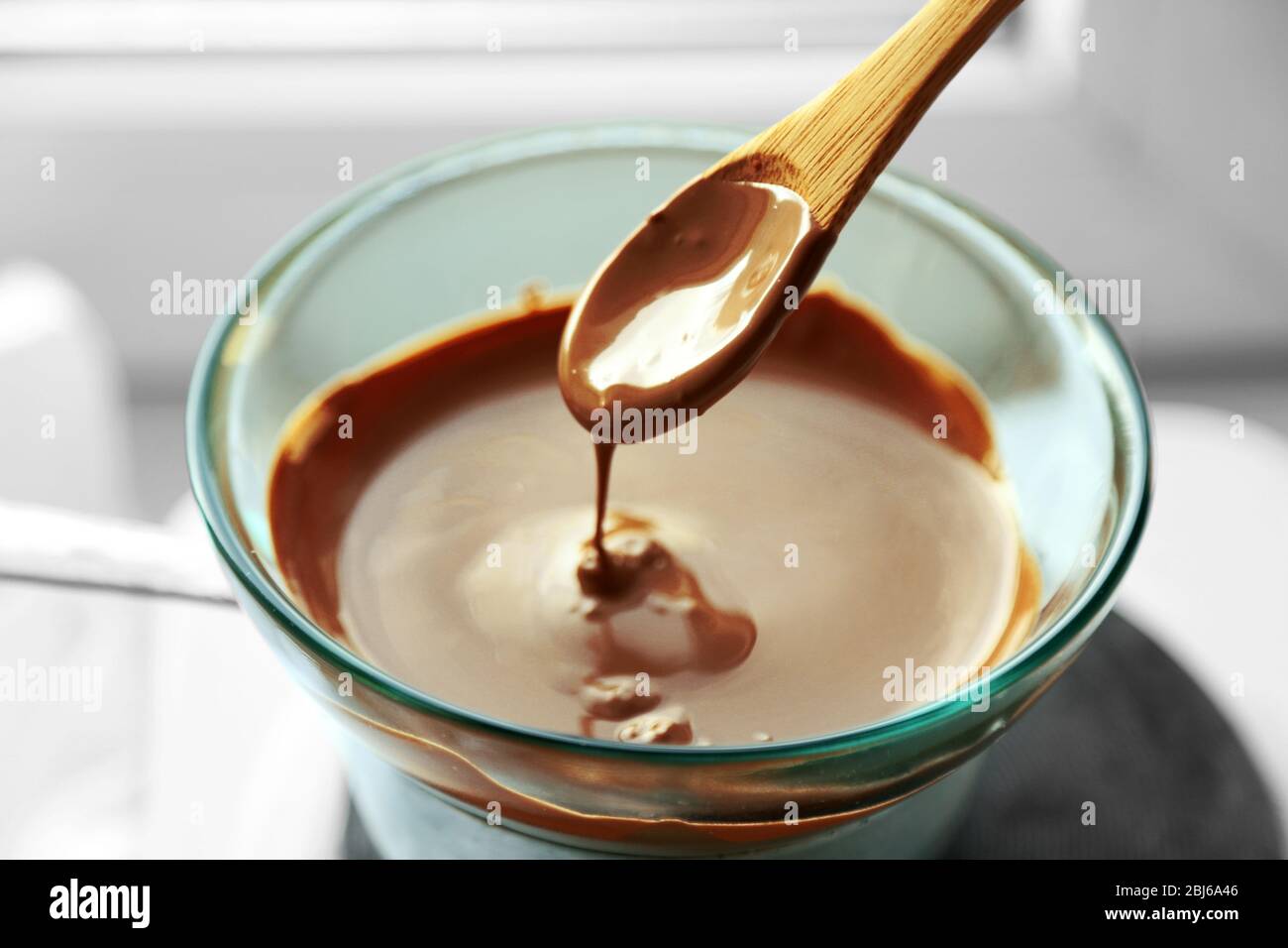 Melting chocolate on stove Stock Photo Alamy