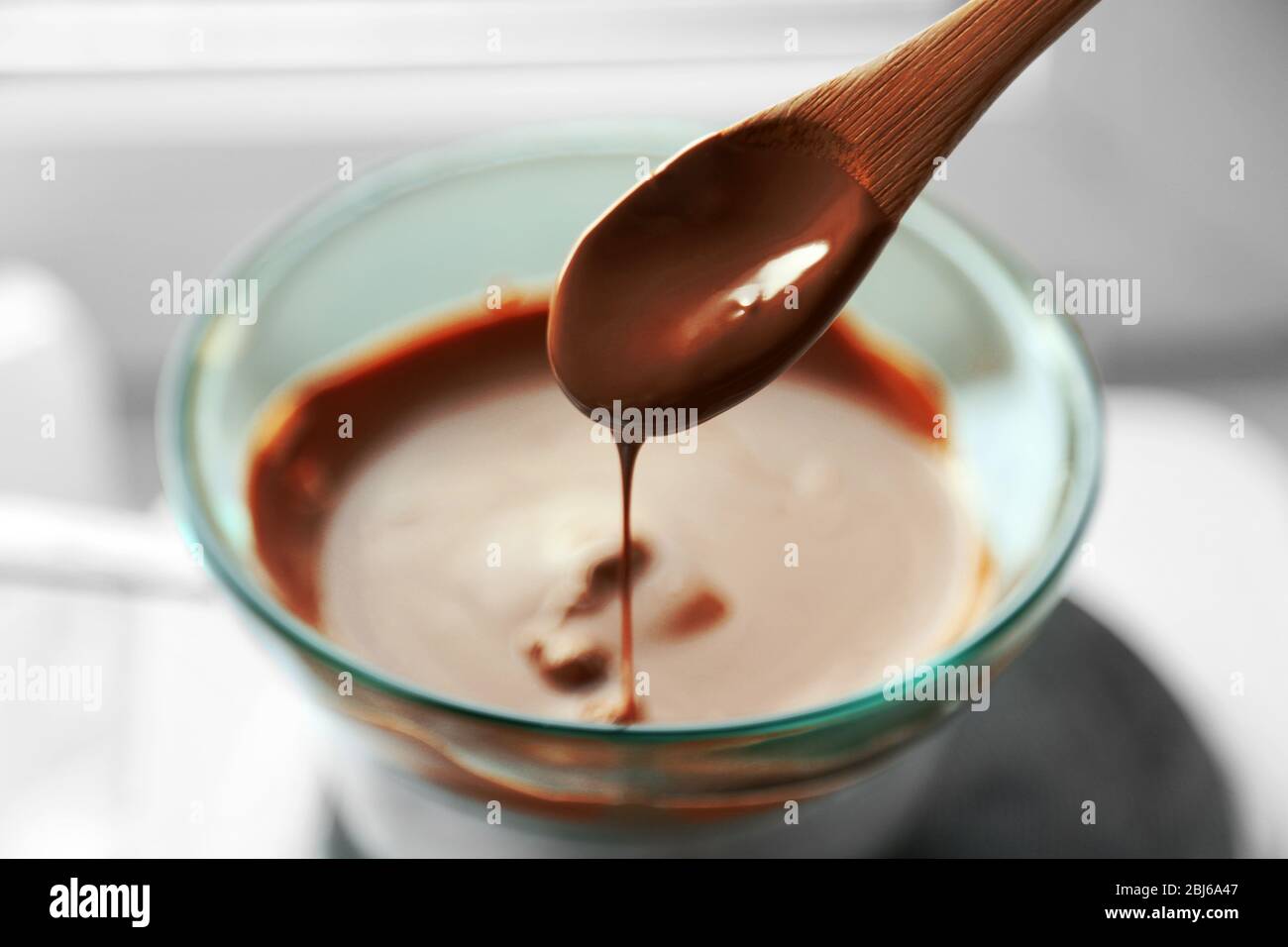 Melting chocolate on stove Stock Photo Alamy