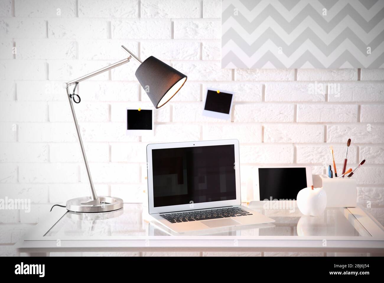 Modern workplace on brick hi-res stock photography and images - Alamy
