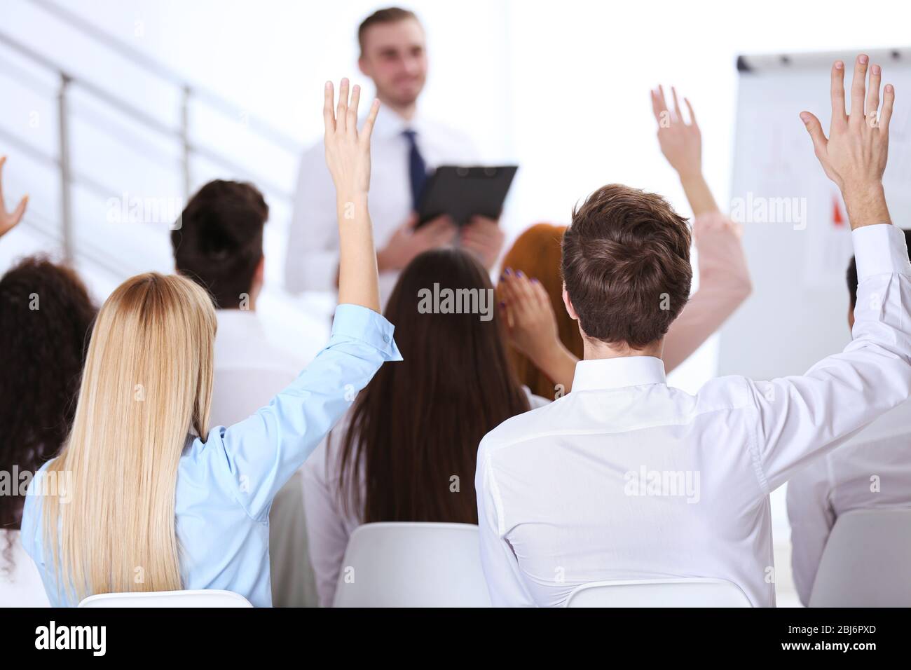 Raise hands opinion hi-res stock photography and images - Alamy