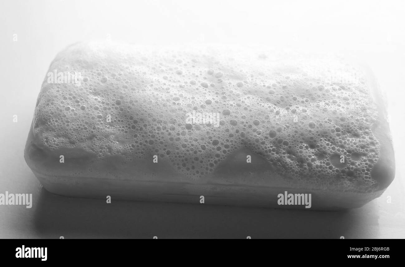Soap with foam, isolated on white Stock Photo Alamy