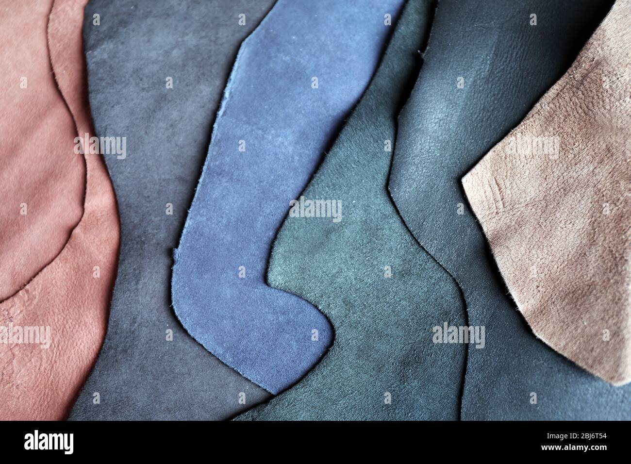 Ragged leather material wrong side background Stock Photo