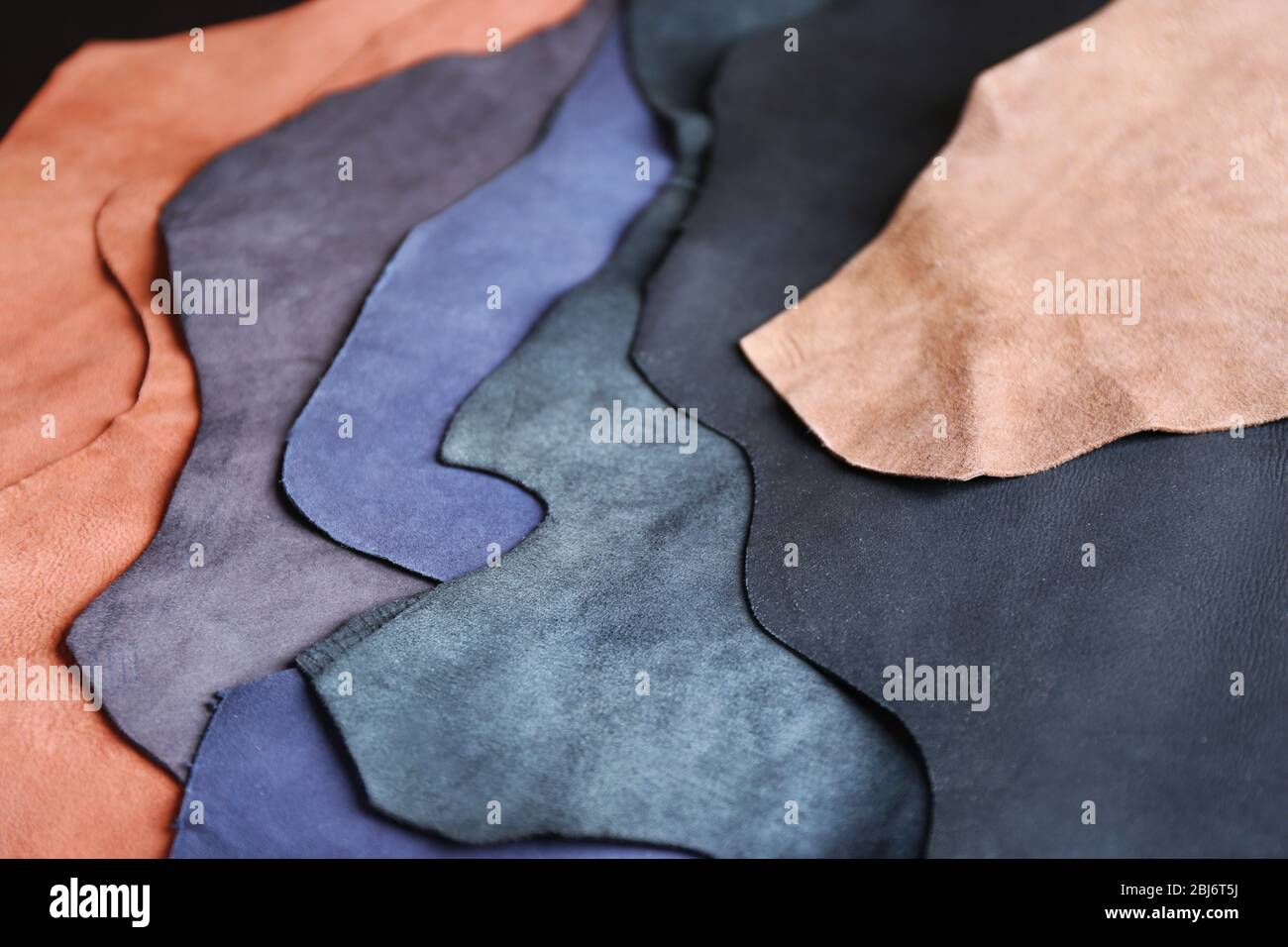 Ragged leather material wrong side background Stock Photo