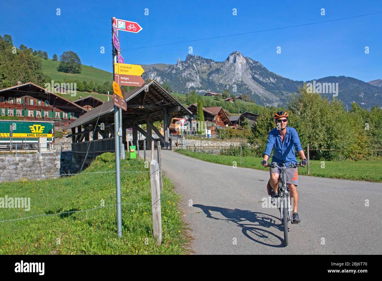 Cycling in the Simmental along the national Lakes Route Stock Photo