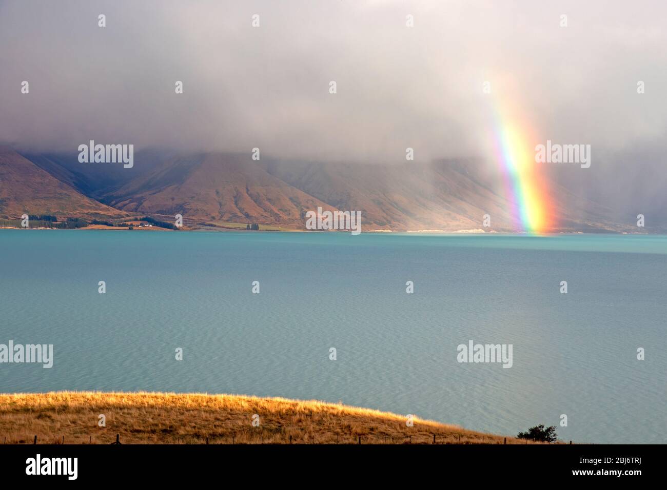 Rainbow over Lake Pukaki Stock Photo