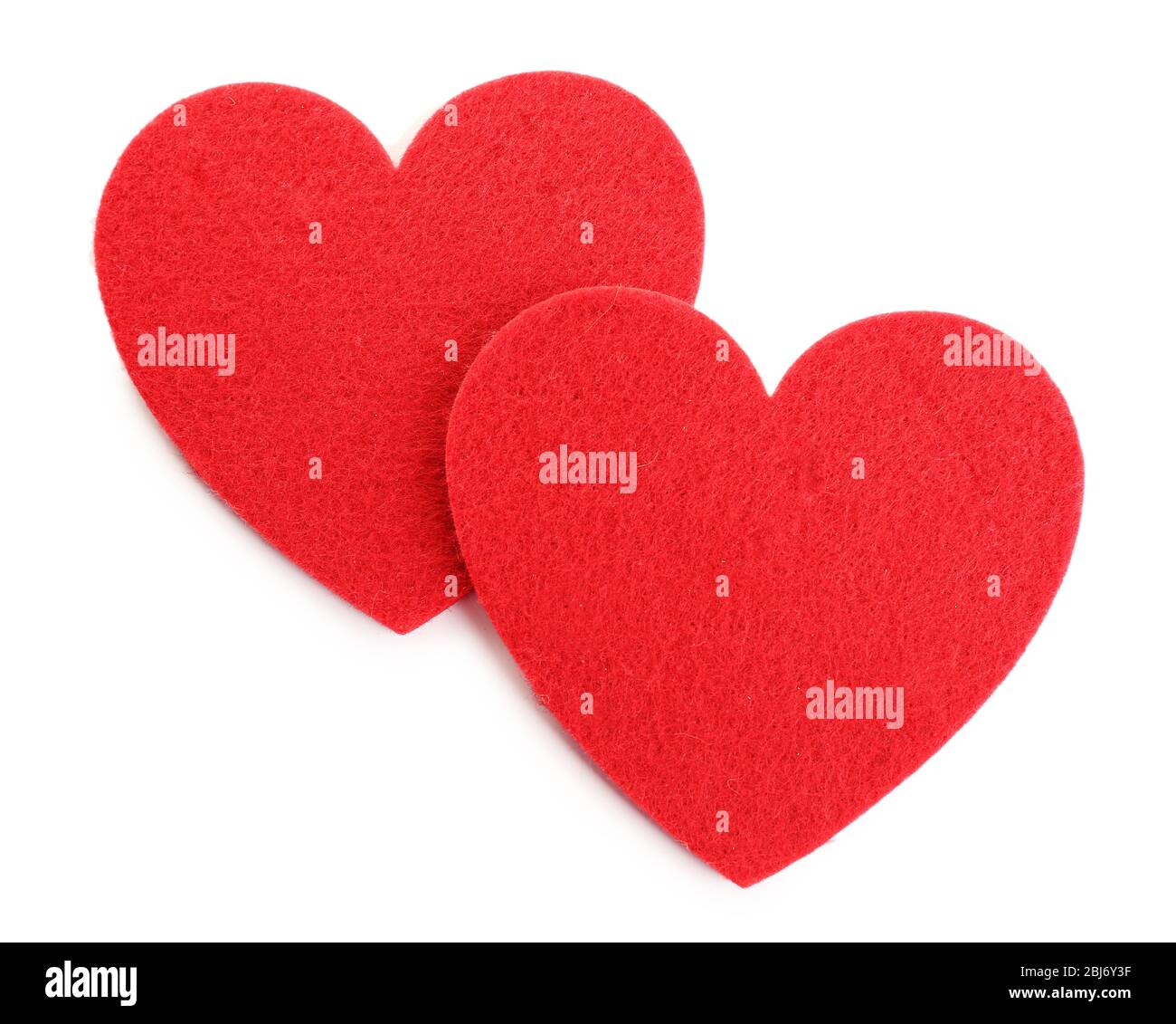 Red felt hearts isolated on white background Stock Photo - Alamy