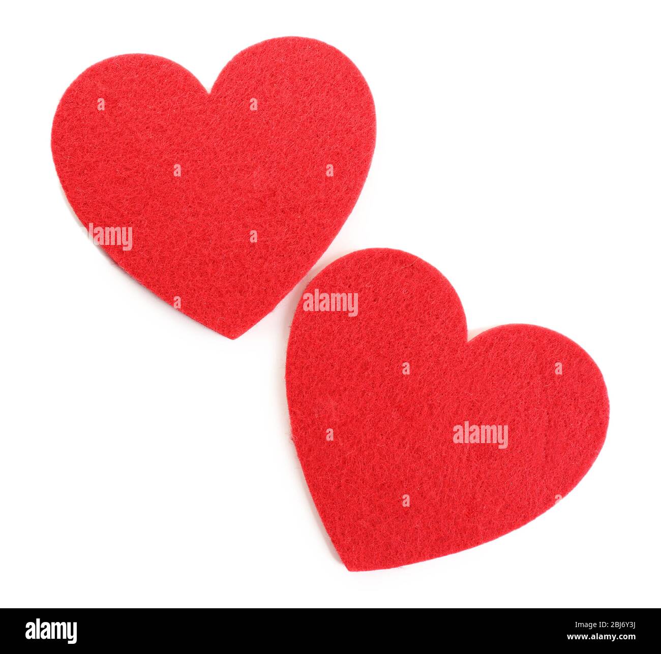 Red felt hearts isolated on white background Stock Photo - Alamy