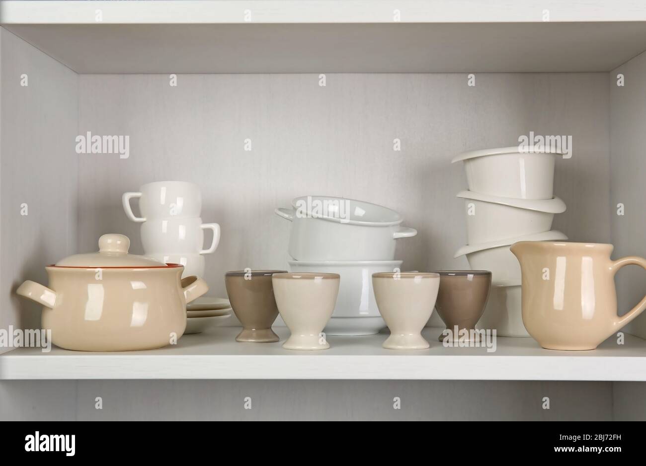 Dishes in cupboard in the kitchen, Copyright-free photo (by M. Vorel)