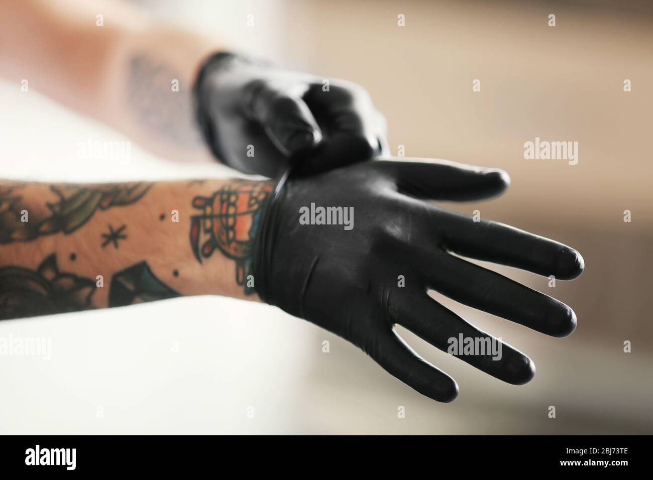 Details 51+ black latex gloves tattoo best in.cdgdbentre